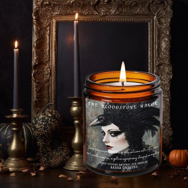 the bloodstone manor, scented candle, home fragrances, greek mythology, goddess of , bookish candle, book lover candle, book nerd candle, literary candle gift, co worker gifts, small batch candle, eco friendly candle, amber jar candles, green witch, practical magic, vampire, gothic, fall spice, fall candle, autumnal, pumpkin spice, halloween, spooky, haunted, ghost, witchy, booktok,dark academia, gift for witches, witchy gifts, witchcraft, fall leaves, autumn, basic witch, kitchen witch