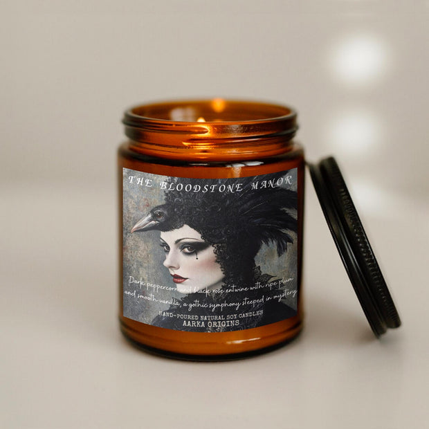 the bloodstone manor, scented candle, home fragrances, greek mythology, goddess of , bookish candle, book lover candle, book nerd candle, literary candle gift, co worker gifts, small batch candle, eco friendly candle, amber jar candles, green witch, practical magic, vampire, gothic, fall spice, fall candle, autumnal, pumpkin spice, halloween, spooky, haunted, ghost, witchy, booktok,dark academia, gift for witches, witchy gifts, witchcraft, fall leaves, autumn, basic witch, kitchen witch