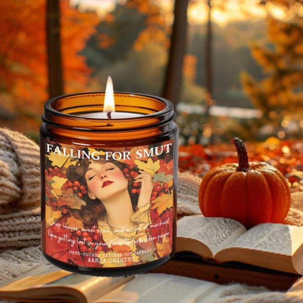 Falling for Smut Candle with rich scent notes of Crisp Leaves, Sweet Spice & Mischief Hand-poured in the USA with natural soy wax and phthalate-free, luxury fragrances.